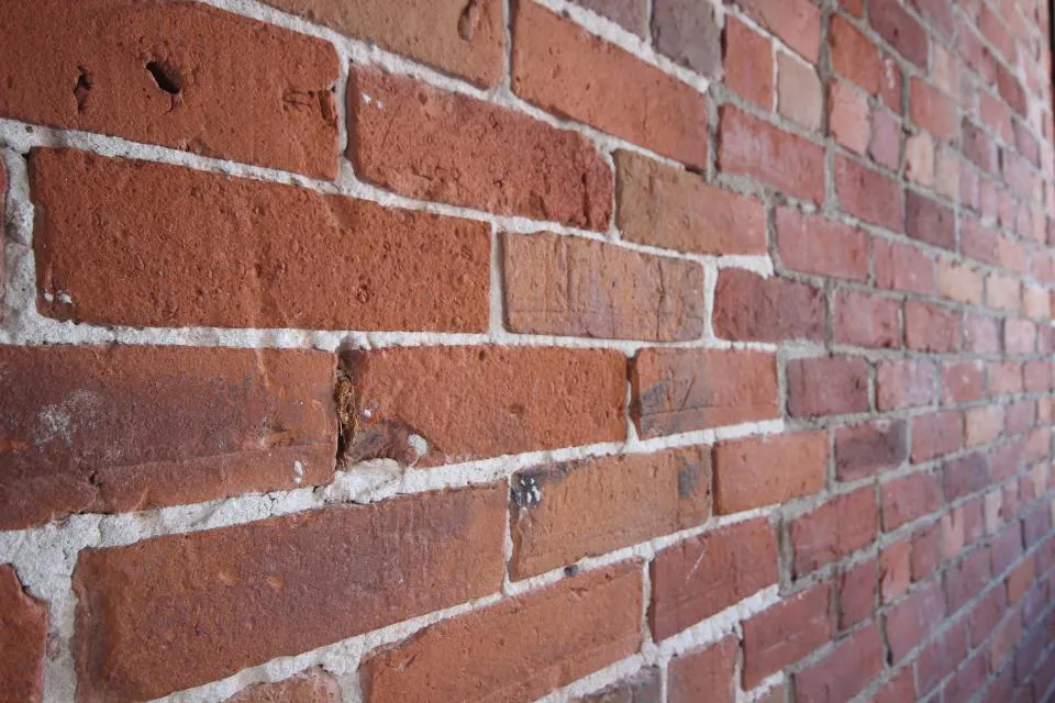 Close view of brick courses and mortar joints