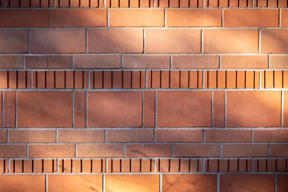 Brick wall with decorative soldier course bands