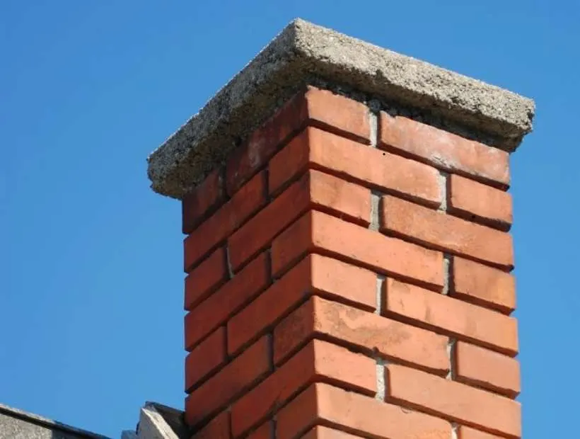 Rebuilt brick chimney with a concrete crown, masonry work by Sidewalk Repair Near Me in NYC